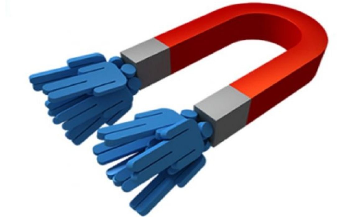 Imán atrayendo figuras de personas.