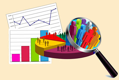 Lupa enfocando una gráfica de segmentos de mercado.